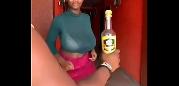  GHANA GIRL OPENS A BOTTLED DRINK WITH HER BREASTS